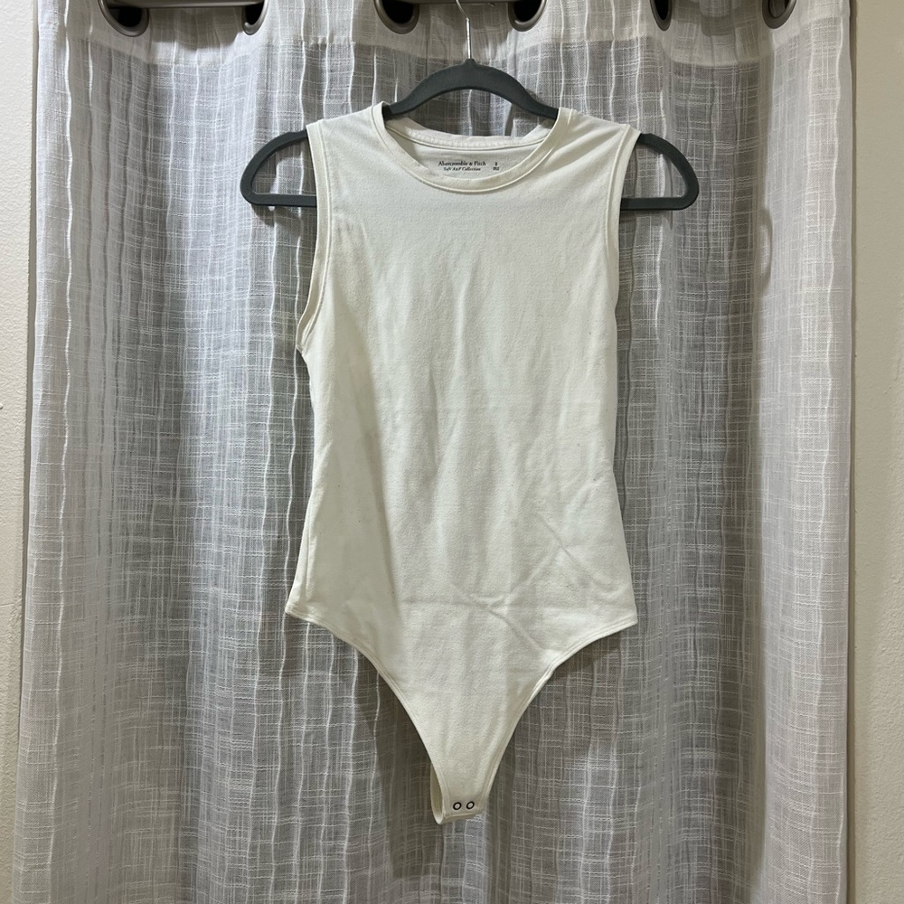 Cream body suit
